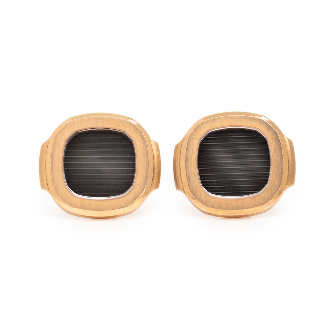 Patek Philippe, Yellow Gold 'Nautilus' Cufflinks, Large: Patek Philippe, Yellow Gold 'Nautilus' Cufflinks, Large With a blue-gray center. 18 karat yellow gold. 3/4 inch wide. Stamp: PATEK PHILIPPE GENEVE SWISS (Patek Philippe maker's mark) 750 (Swiss hallma