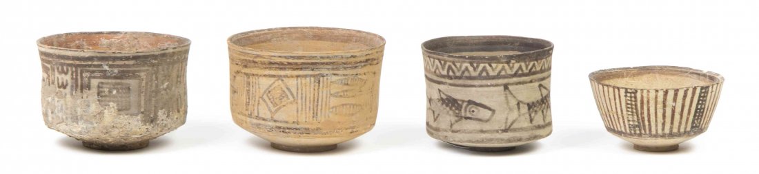Four Middle Eastern Pottery Bowls, Diameter of largest: Four Middle Eastern Pottery Bowls, three of cylindrical form, one hemispherical. Diameter of largest 4 inches. Property from the Estate of Dr. Ivan Jeanne Weiler, Urbana, Illinois