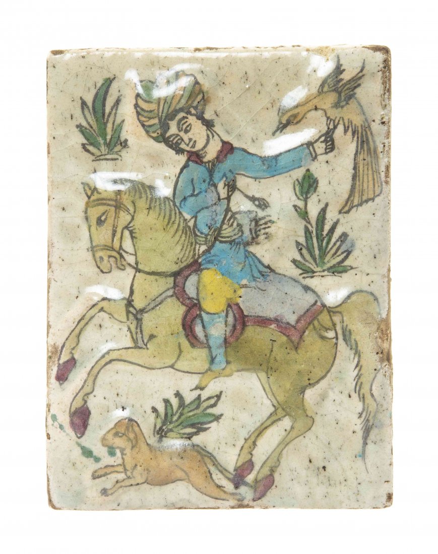 A Middle Eastern Pottery Tile, Height 9 7/8 x width 7: A Middle Eastern Pottery Tile, of rectangular form with a polychrome depiction of a turbaned man on horseback. Height 9 7/8 x width 7 1/8 inches.