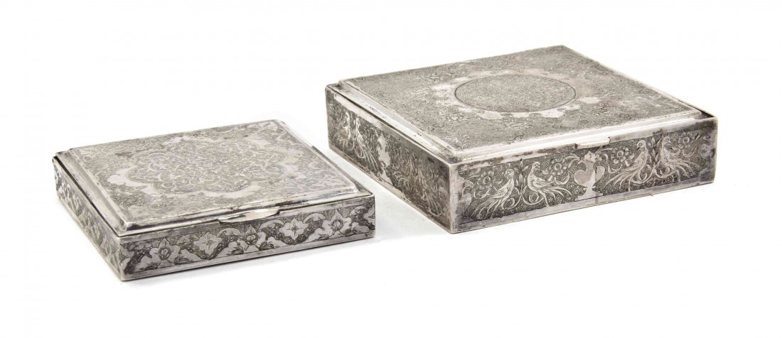 Two Middle Eastern Silvered Boxes, Width of wider 3 3/4: Two Middle Eastern Silvered Boxes, each of square form with a hinged lid and gilt wash interior, with incised foliate decoration. Width of wider 3 3/4 inches. Property from the Estate of Mr. Emanuel F