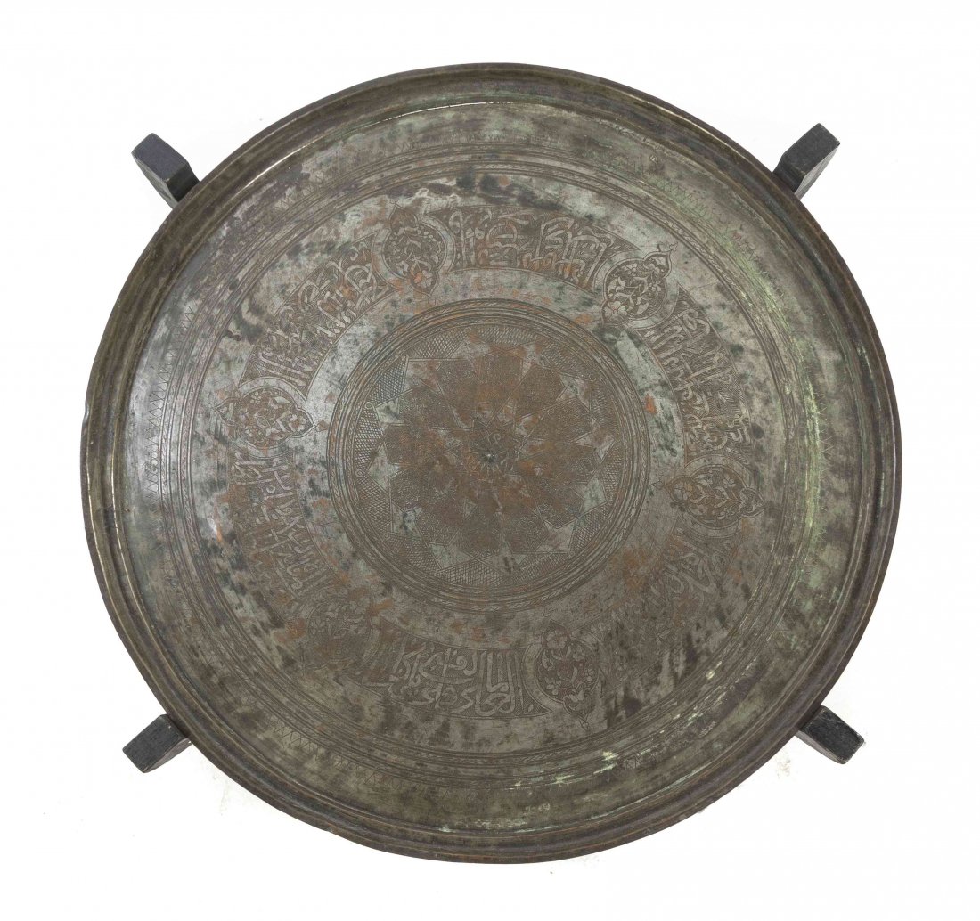 A Middle Eastern Tray, Height 27 x diameter 27 1/4: A Middle Eastern Tray, of circular form with calligraphic inscriptions, raised on a later stand. Height 27 x diameter 27 1/4 inches.