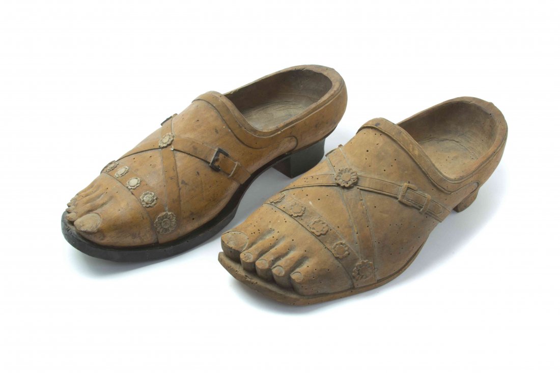 A Pair of Continental Carved Boxwood Shoes, Width 13: A Pair of Continental Carved Boxwood Shoes, each carved as a foot wearing a heeled sandal. Width 13 1/2 inches.