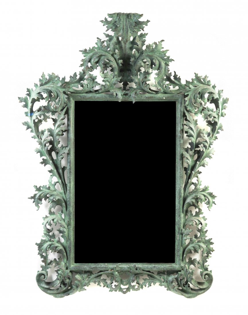 A Baroque Carved and Painted Wood Pier Mirror, Height: A Baroque Carved and Painted Wood Pier Mirror, having a rectangular vertical plate within an elaborate foliate carved frame with a faux verdigris finish throughout. Height 59 x width 38 1/4 inches. Pr