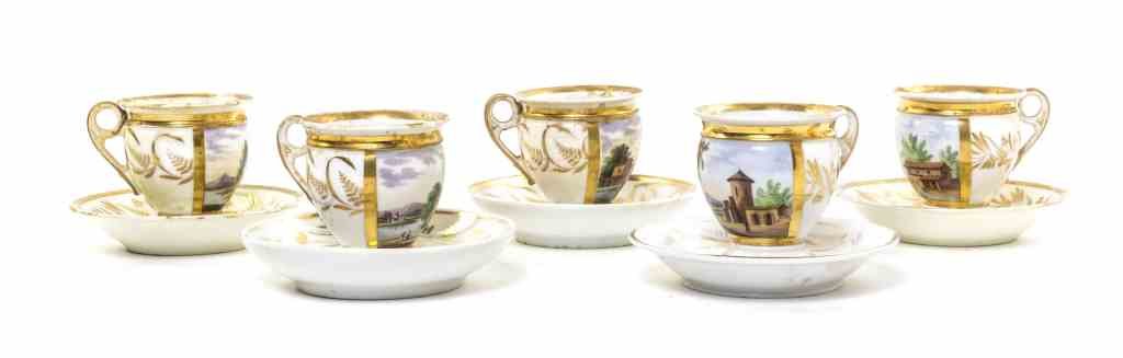 A Set of Five Berlin (K.P.M.) Porcelain Teacups and: A Set of Five Berlin (K.P.M.) Porcelain Teacups and Saucers, each teacup decorated with a landscape scene, the teacups and saucers each with further gilt wheat decoration. Height of teacup 3 inches. P