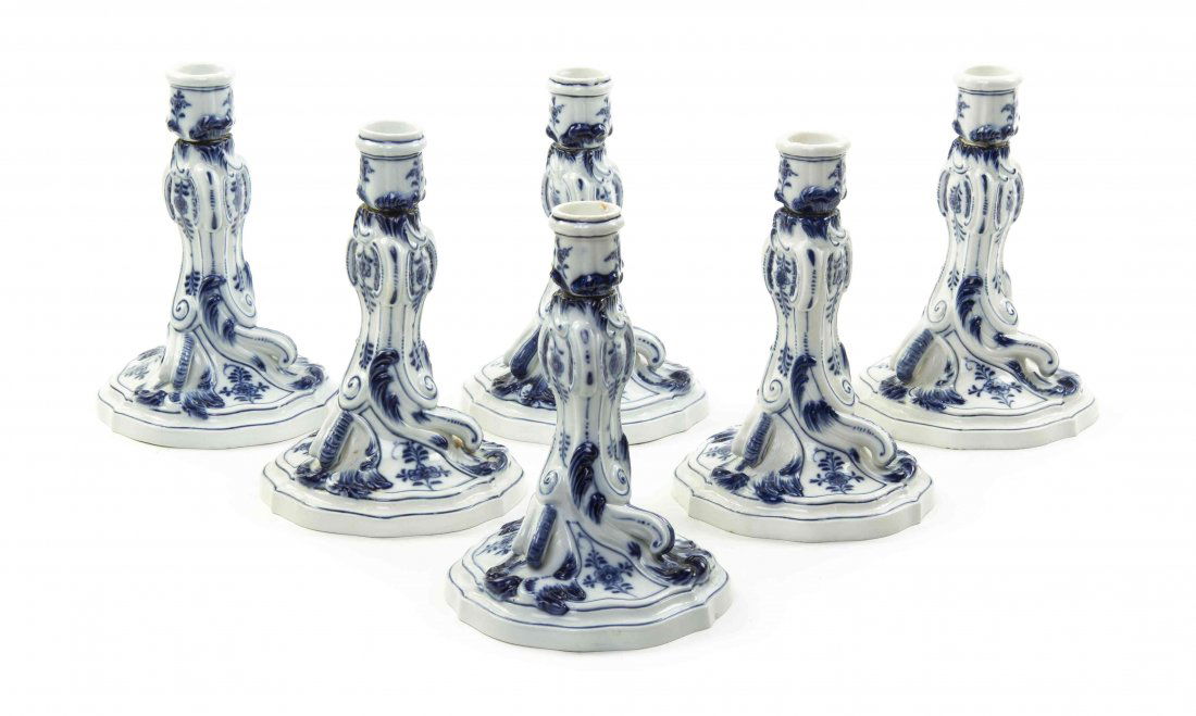 Six Meissen Porcelain Candlesticks, Height 6 3/4: Six Meissen Porcelain Candlesticks, each of baluster form with Blue Onion decoration, impressed 123 and incised 2617, with crossed swords mark in underglaze blue. Height 6 3/4 inches. Property from th
