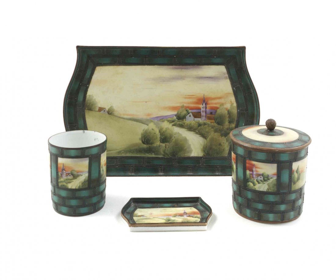 A Nippon Porcelain Smoking Set, Width of tray 10 7/8: A Nippon Porcelain Smoking Set, comprising a humidor, an open cigarette tumbler, an ash receiver and a tray, each having geometric decoration and a painted landscape panel. Width of tray 10 7/8 inches