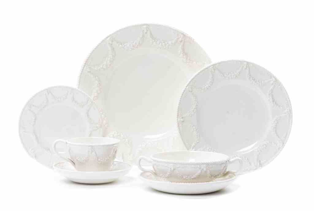 A Wedgwood Porcelain Dinner Service for Twelve,: A Wedgwood Porcelain Dinner Service for Twelve, in the Queensware pattern, comprising dinner plates, salad plates, bread plates, soup bowls, soup saucers, teacups and saucers; 84 items total. Diameter