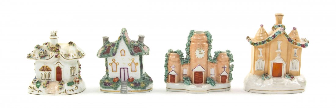 Four Staffordshire Cottages, Height of tallest 5 1/2: Four Staffordshire Cottages, comprising two incense burners, a spill vase depicting a clock tower and a model of a cottage. Height of tallest 5 1/2 inches.