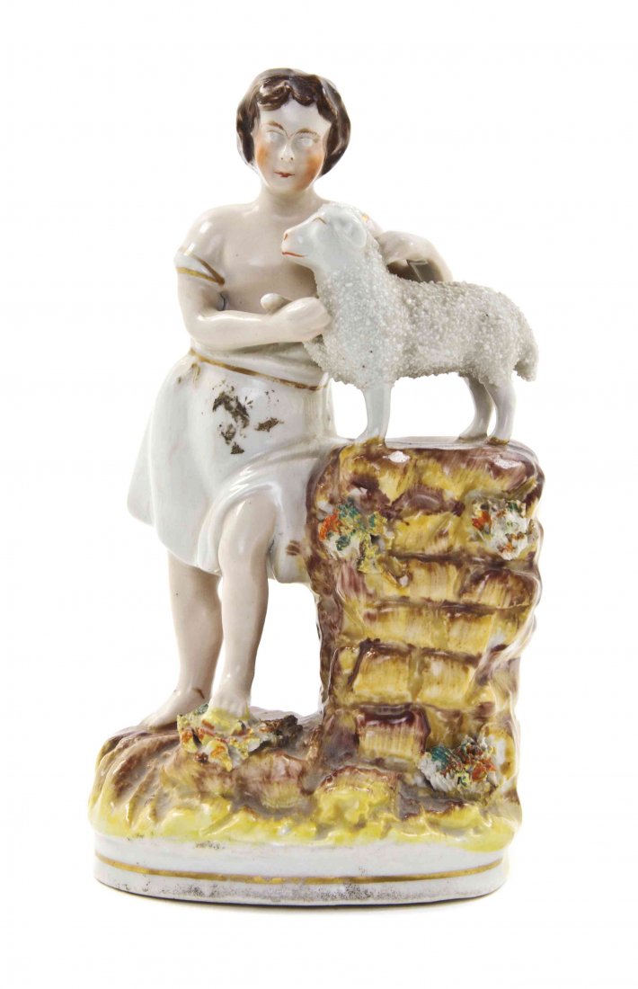 A Staffordshire Pottery Biblical Figural Group, Height: A Staffordshire Pottery Biblical Figural Group, depicting Isaac and the lamb. Height 7 inches.