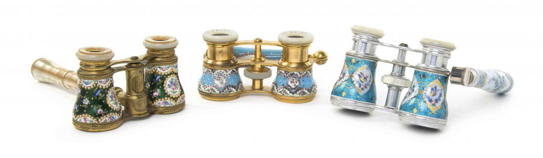 Three Pairs of French Enameled Opera Glasses, Width of: Three Pairs of French Enameled Opera Glasses, comprising one by Lemaire, the cylinders and side handle with foliate and bird decoration on a teal ground with mother-of-pearl eyepieces and focal wheel