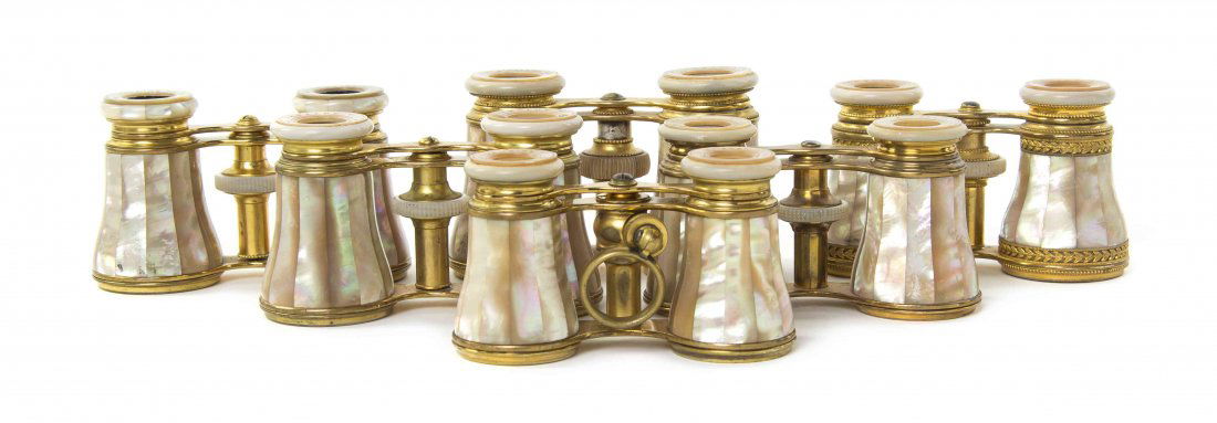 Six Pairs of French Mother-of-Pearl Veneered Opera: Six Pairs of French Mother-of-Pearl Veneered Opera Glasses, Lemaire, each having faceted veneers with a brass frame. Width of widest 4 3/8 inches. Property from the Estate of Mr. Mark Fritz, West Bloo