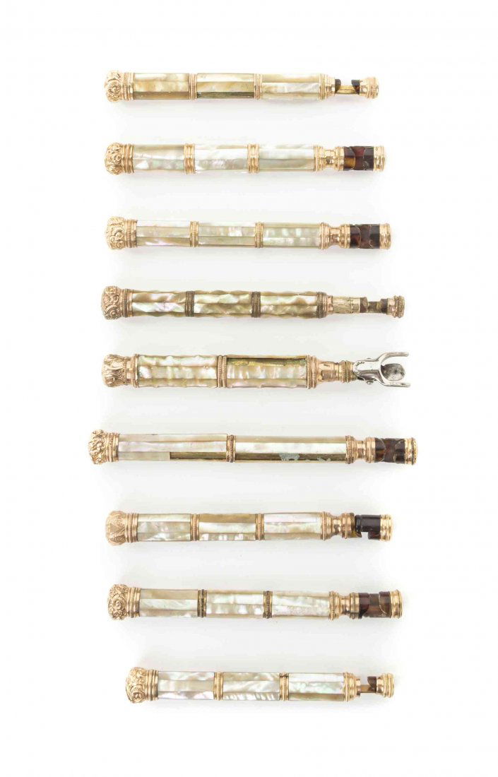 Nine French Mother-of-Pearl Veneered Opera Glass: Nine French Mother-of-Pearl Veneered Opera Glass Handles, each of cylindrical form with gold tone mounts. Length of longest 6 inches. Property from the Estate of Mr. Mark Fritz, West Bloomfield, Michi