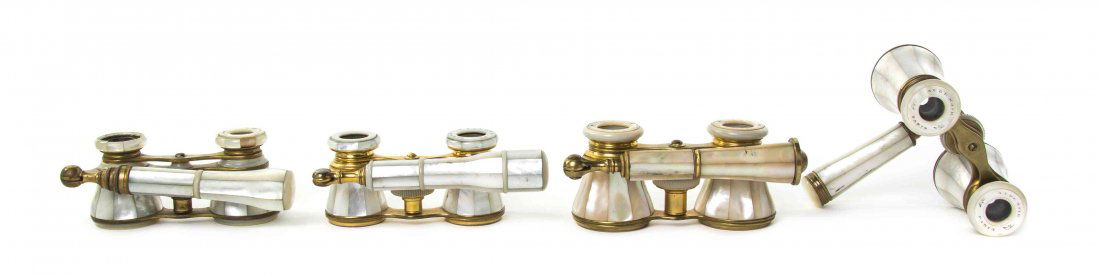 Four Pairs of Mother-of-Pearl Veneered Opera Glasses,: Four Pairs of Mother-of-Pearl Veneered Opera Glasses, comprising one example by Audemaire, one by Monroy and one by Balland, each having faceted veneers, three with a side swing handle, one with a cen