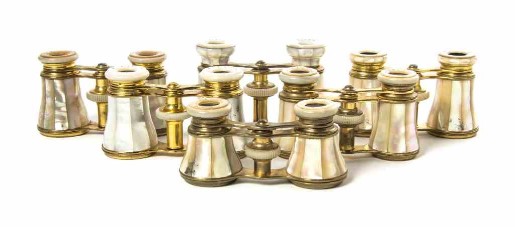 Six Pairs of French Mother-of-Pearl Veneered Opera: Six Pairs of French Mother-of-Pearl Veneered Opera Glasses, comprising three by Lemaire, two by Iris and one by Colmont, each with mother-of-pearl eyepieces, focal wheel and faceted cylinders, having