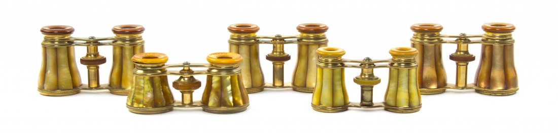 Five Pairs of French Mother-of-Pearl Veneered Opera: Five Pairs of French Mother-of-Pearl Veneered Opera Glasses, four by Lemaire and one by The Elite, each having yellow faceted veneers with a brass frame. Width of widest 4 1/8 inches. Property from th