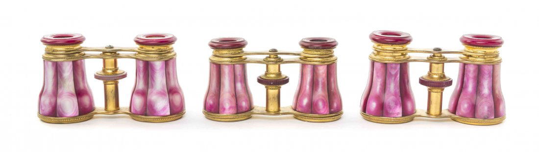 Three Pairs of French Mother-of-Pearl Veneered Opera: Three Pairs of French Mother-of-Pearl Veneered Opera Glasses, Lemaire, each having pink faceted veneers with a brass frame. Width of widest 4 inches. Property from the Estate of Mr. Mark Fritz, West B