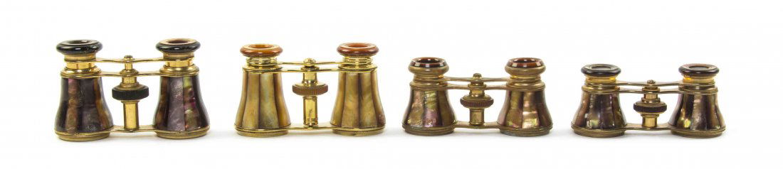 Four Pairs of French Mother-of-Pearl Veneered Opera: Four Pairs of French Mother-of-Pearl Veneered Opera Glasses, one by Colmont, one by Audemair, one by La Corona and the last by Iris, each having brown faceted veneers and a brass frame. Width of wides