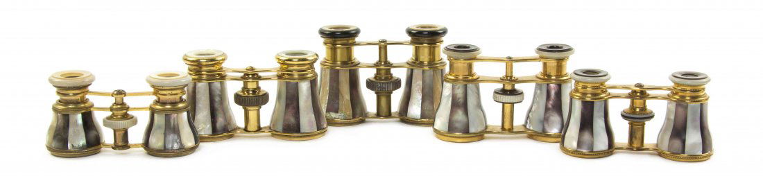Five Pairs of French Mother-of-Pearl Veneered Opera: Five Pairs of French Mother-of-Pearl Veneered Opera Glasses, one by Audemair, one by Le Fils, each having alternating abalone and mother-of-pearl veneers and having a brass frame. Width of widest 4 1/