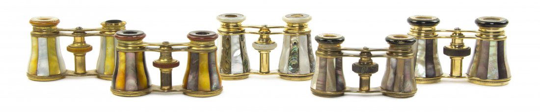 Five Pairs of French Mother-of-Pearl Veneered Opera: Five Pairs of French Mother-of-Pearl Veneered Opera Glasses, two by Lemaire and one by Lamier, each with alternating faceted veneers with a brass frame. Width of widest 4 1/8 inches. Property from the