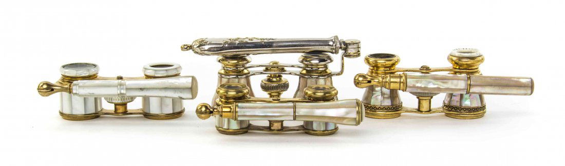 Four Pairs of French Mother-of-Pearl Veneered Opera: Four Pairs of French Mother-of-Pearl Veneered Opera Glasses, comprising one example by Leclaire and one by Narcissus, two with barrel form cylinders, each having faceted veneers and a side swing handl