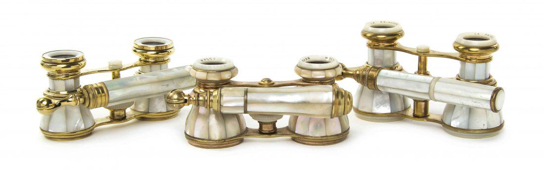 Three Pairs of Continental Mother-of-Pearl Veneered: Three Pairs of Continental Mother-of-Pearl Veneered Opera Glasses, comprising one example by La Princesse, Paris and one by F. Hinselmann, Essen, each having faceted veneers and a side swing handle, w
