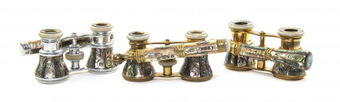 Three Pairs of French Abalone Veneered Opera Glasses,: Three Pairs of French Abalone Veneered Opera Glasses, one by Iris, the other retailed by Hofman, Columbus, OH, each with faceted veneers and a swing handle, with abalone veneered eyepieces, two with b