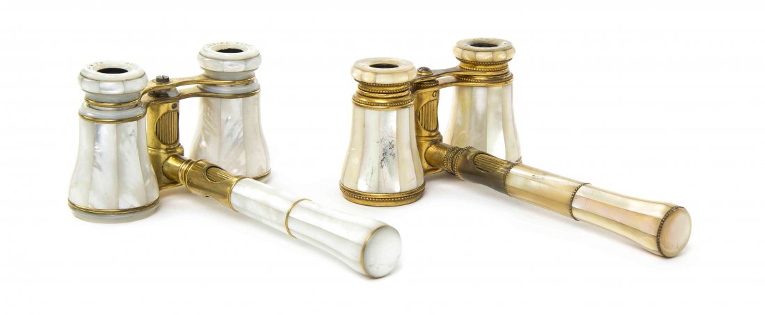 Two Pairs of French Mother-of-Pearl Veneered Opera: Two Pairs of French Mother-of-Pearl Veneered Opera Glasses, Lemaire, Paris, one retailed by Spaulding & Co., Chicago, each having faceted veneered cylinders and a central handle, with mother-of-pearl