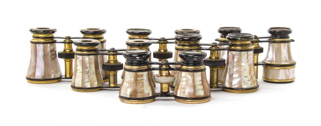 Six Pairs of Mother-of-Pearl Veneered Opera Glasses,: Six Pairs of Mother-of-Pearl Veneered Opera Glasses, comprising three by Lemaire, each having faceted veneers with a brass and ebonized frame. Width of widest 4 1/4 inches. Property from the Estate of