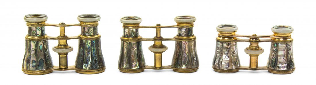 Three Pairs of French Abalone Veneered Opera Glasses,: Three Pairs of French Abalone Veneered Opera Glasses, one by Lemaire, each having faceted veneers with a brass frame. Width of widest 3 3/4 inches. Property from the Estate of Mr. Mark Fritz, West Blo