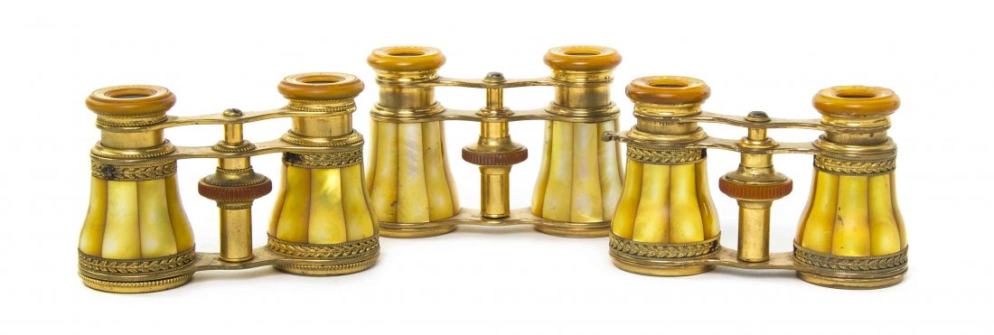 Three Pairs of French Mother-of-Pearl Veneered Opera: Three Pairs of French Mother-of-Pearl Veneered Opera Glasses, Lemaire, each having faceted yellow veneers and a gilt frame. Width of widest 3 7/8 inches. Property from the Estate of Mr. Mark Fritz, We