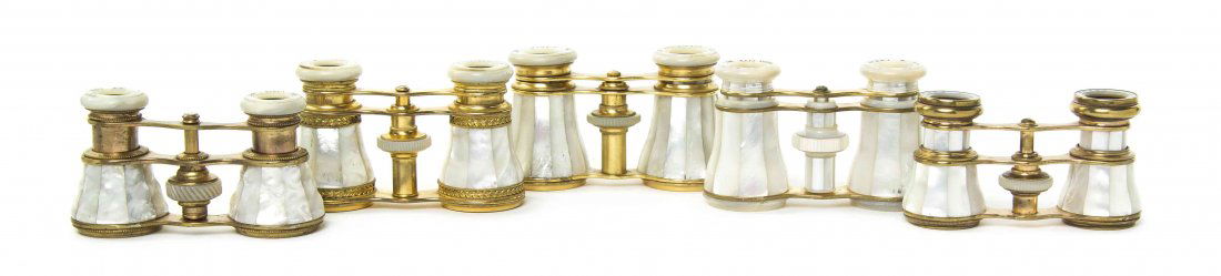 Five Pairs of French Mother-of-Pearl Veneered Opera: Five Pairs of French Mother-of-Pearl Veneered Opera Glasses, two by Lemaire, two by Audemair and one by Le Fils, each having faceted veneers, set in a brass frame. Width of widest 4 1/8 inches. Proper