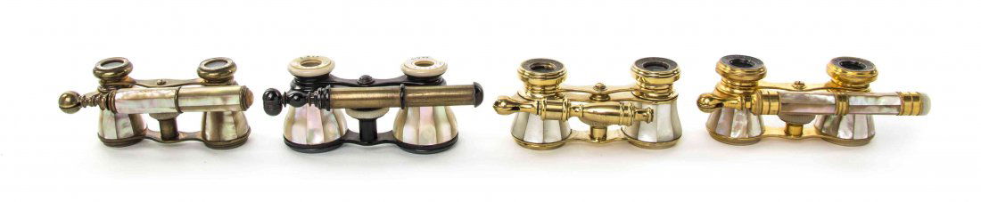 Four Pairs of Mother-of-Pearl Veneered Opera Glasses,: Four Pairs of Mother-of-Pearl Veneered Opera Glasses, comprising two examples by Iris, one by La Belle and one by Stewart Dawson & Co., London, each having faceted veneers and swing handle, two with m