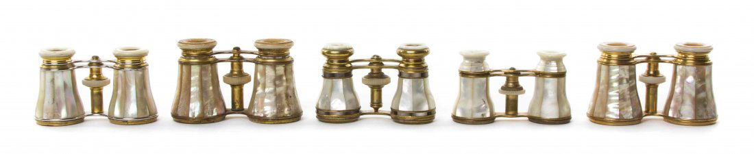 Five Pairs of French Mother-of-Pearl Veneered Opera: Five Pairs of French Mother-of-Pearl Veneered Opera Glasses, comprising two by Lemaire, each having faceted veneers with a brass frame. Width of widest 4 1/4 inches. Property from the Estate of Mr. Ma