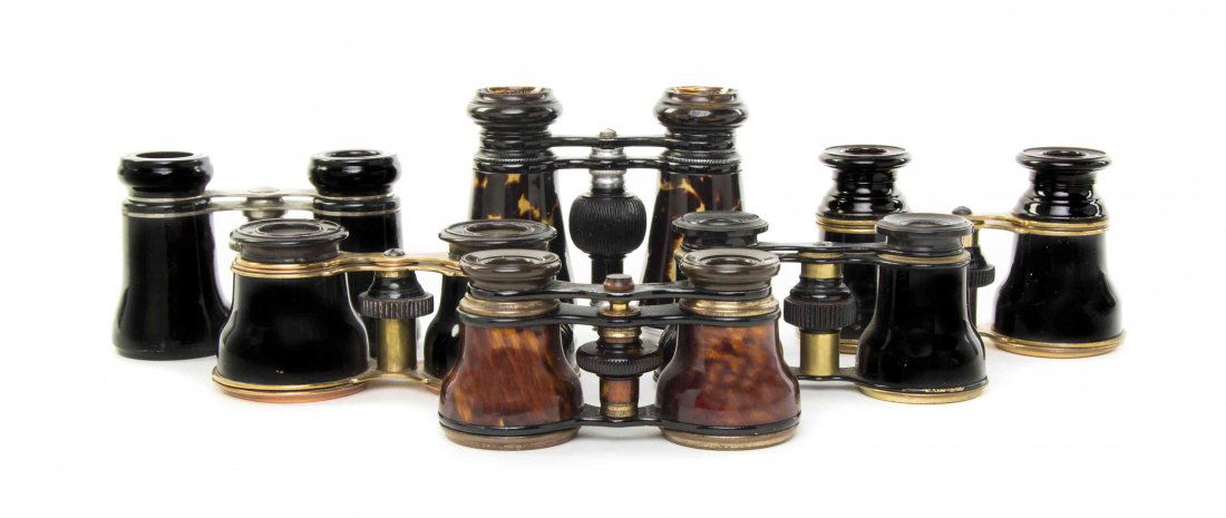 Six Pairs of Opera Glasses with Various Finishes, Width: Six Pairs of Opera Glasses with Various Finishes, comprising four with ebonized frames, one with a faux enamel and one with a faux tortoise shell frame, each set with a brass, steel or ebonized frame,