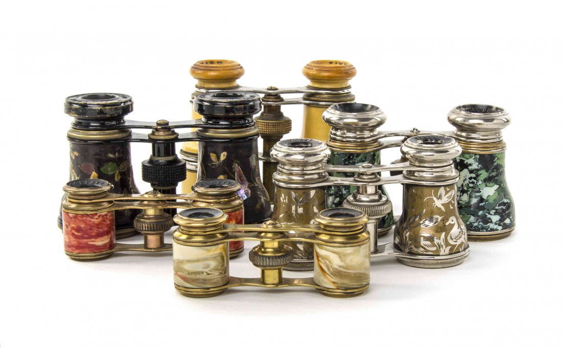 Six Pairs of Various Finish Opera Glasses, Width of: Six Pairs of Various Finish Opera Glasses, comprising examples by Lamier, Latour, Jumelle Chevalier, Sportiere and Audemair, with enameled, composite, faux malachite and leather finishes, each with a