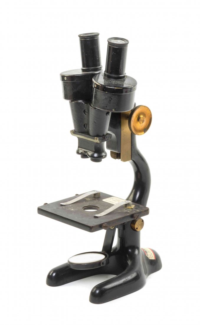 An American Brass and Iron Binocular Head Microscope,: An American Brass and Iron Binocular Head Microscope, Bausch & Lomb, Rochester, New York, 1924. Height 14 1/2 inches (extended). Property from the Estate of Roy Francis Daleo, Chicago, Illinois