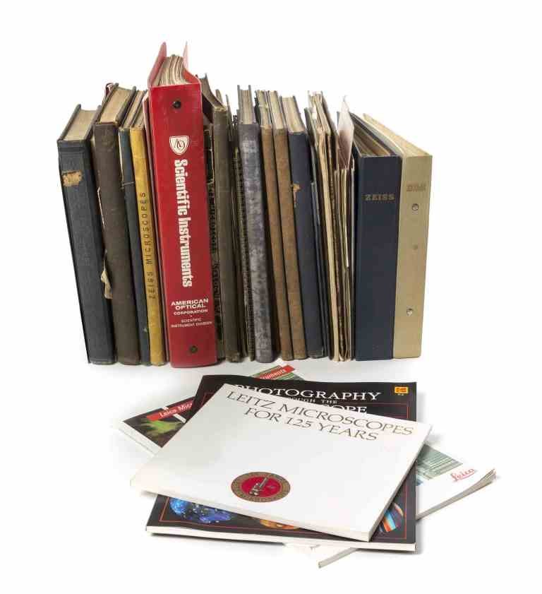 A Collection of Books, Catalogues and Ephemera: A Collection of Books, Catalogues and Ephemera pertaining to Microscopes and Optics, including volumes on Bausch & Lomb, Zeiss, Reichert and others; approximately 40 total. Property from the Estate of