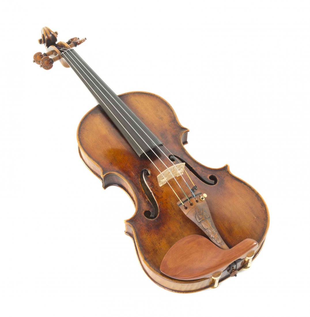 An Argentinian Violin, Daniel A. Karinkanta, Length 23: An Argentinian Violin, Daniel A. Karinkanta, having foliate carved pegs, the tailpiece carved with a violinist, labeled Daniel A. Karinkanta, Bernal Buenos Aires, Ano 1995, together with a fitted Amer