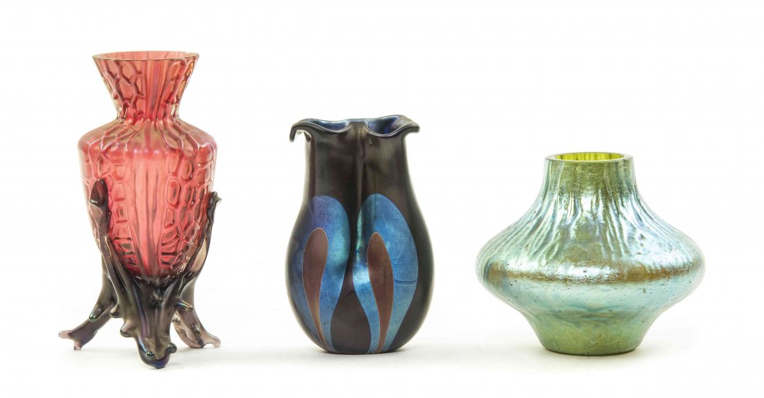 An American Studio Glass Vase, Mark Peiser (b. 1938),: An American Studio Glass Vase, Mark Peiser (b. 1938), of double form with an iridescent glaze, together with two Loetz style iridescent glass vases. Height of first 3 5/8 inches. Property from the Est