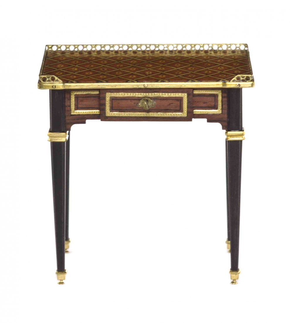 A Louis XV Style Marquetry, Ebonized and Gilt Metal: A Louis XV Style Marquetry, Ebonized and Gilt Metal Mounted Writing Table, Denis E. W. Hillman, having a three-quarter galleried rectangular top over the plain frieze set with a single locking drawer,