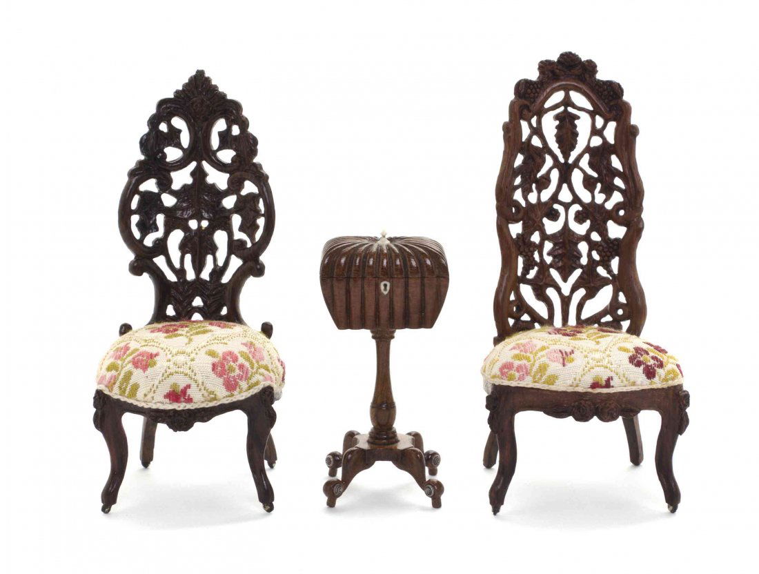 A Pair of Rococo Style Rosewood Side Chairs, Thomas A.: A Pair of Rococo Style Rosewood Side Chairs, Thomas A. Warner, each having a pierce carved back with grape vines, over the upholstered seat, raised on cabriole legs, bearing a brass tag inscribed T. A