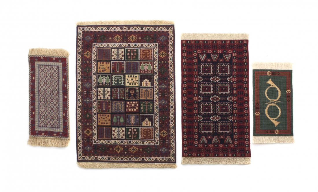 Four Needlepoint Rugs, Dimensions of largest 7 1/4 x 5: Four Needlepoint Rugs, two by Sharon Garmize, inscribed Fox Horn #1 Sharon Garmize and Sharon Garmize 1984 #1 Yomud, another signed Mary Lu Dearring-Tracy 1982, the fourth unsigned. Di