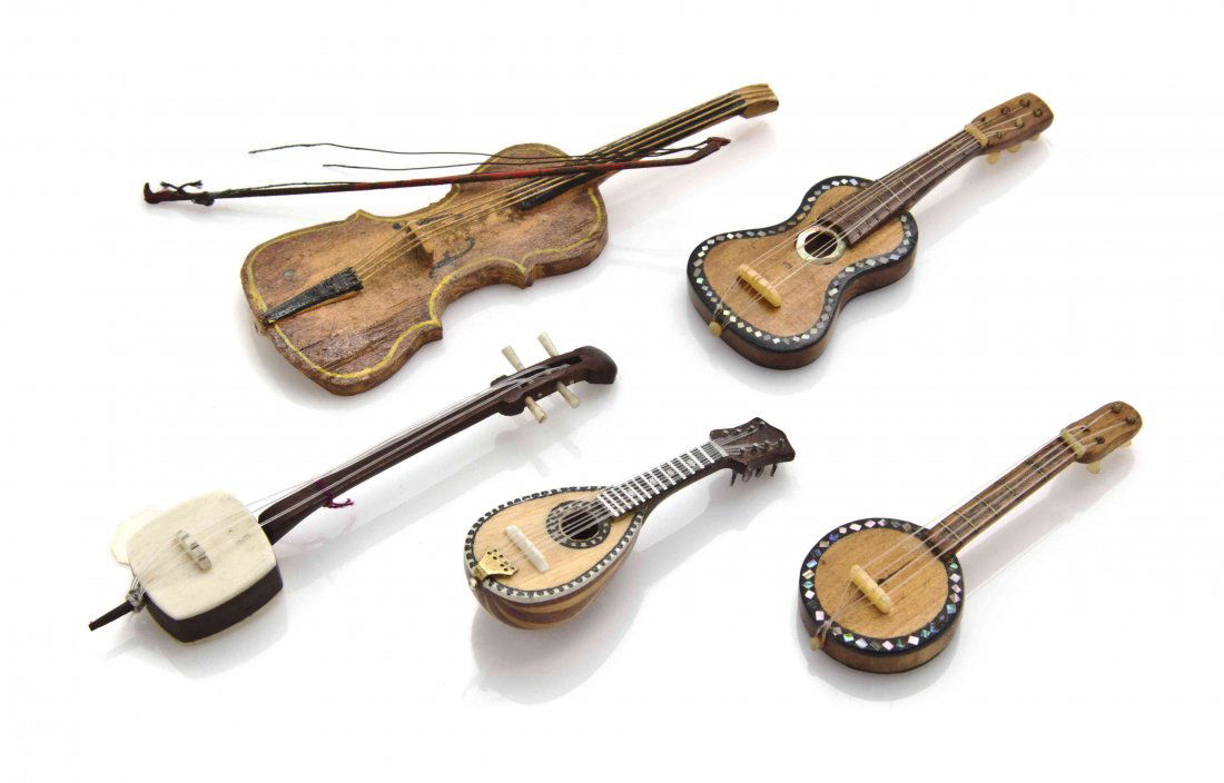 A Group of Five Instruments, Length of longest case 3: A Group of Five Instruments, comprising a mandolin, violins and others, two with abalone inlays, one with bone elements, three with cases. Length of longest case 3 7/8 inches. The Adell Venus Collecti