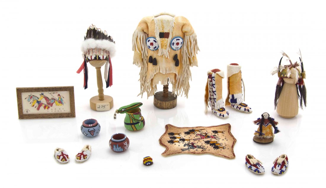 A Collection of Native American Themed Articles, Brian: A Collection of Native American Themed Articles, Brian "Rainbow Hand" and Kathy Tepper, comprising leather, beaded, pottery and art examples, including a war shirt with rosettes, boots, two pairs of m