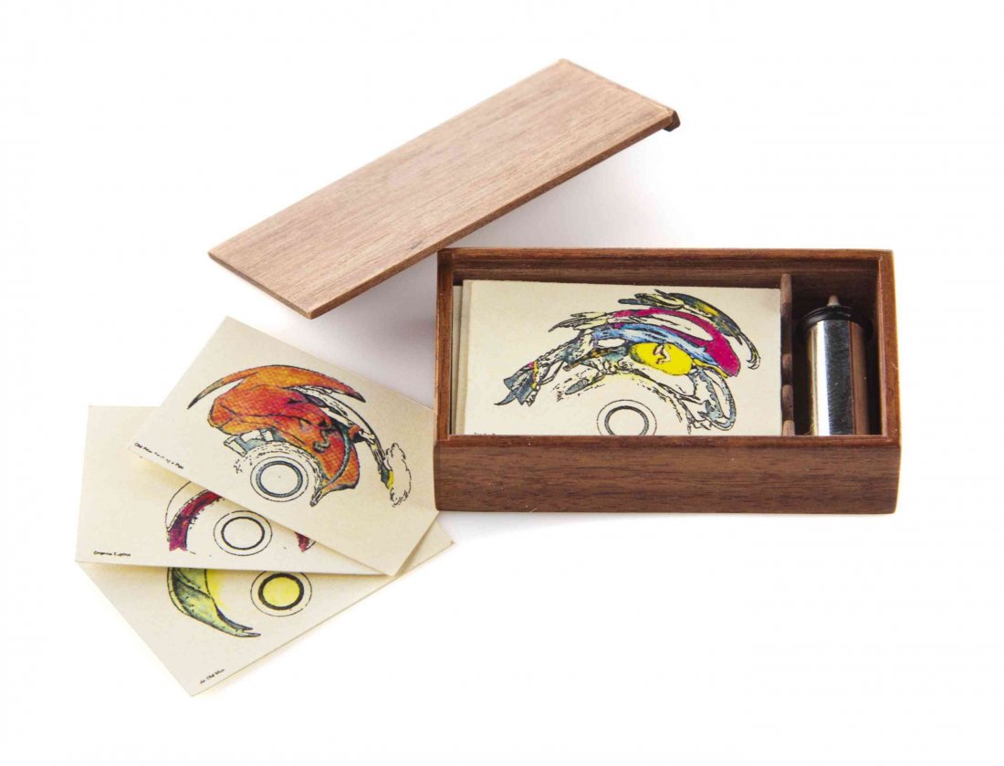 A Walnut Cased Catoptrical Anamorphoses Toy, William R.: A Walnut Cased Catoptrical Anamorphoses Toy, William R. Robertson, containing one cylindrical mirror and 23 handcolored cards, the base inscribed WRR - 95. Width of case 1 5/8 inches. The Adell Venus 