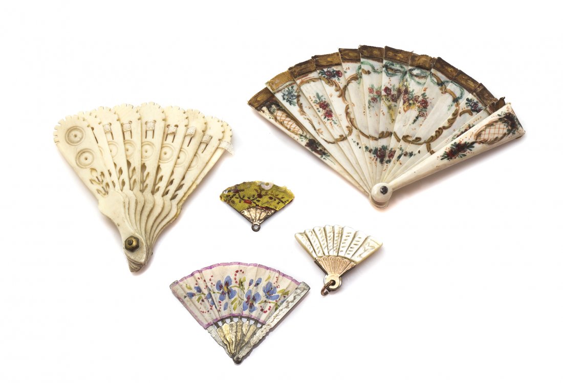 Five Miniature Folding Fans, Width of widest open 3 5/8: Five Miniature Folding Fans, comprising examples made of ivory, bone, mother-of-pearl, silk and paper. Width of widest open 3 5/8 inches. The Adell Venus Collection of Miniatures Property from the Est