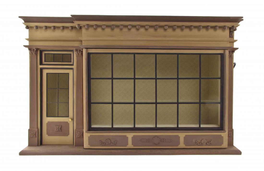 A Painted Wood Store Display Diorama, Eugene Kupjack,: A Painted Wood Store Display Diorama, Eugene Kupjack, having a breakfront molded cornice with spherical drop finials above the conforming body with a front paneled glazed door and window, raised on a