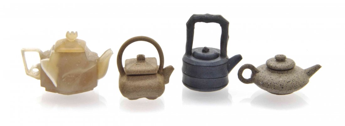 Three Chinese Yixing Style Teapots, Height of tallest 1: Three Chinese Yixing Style Teapots, together with a hardstone example, having incised inscription to one side. Height of tallest 1 inch. The Adell Venus Collection of Miniatures Property from the Esta