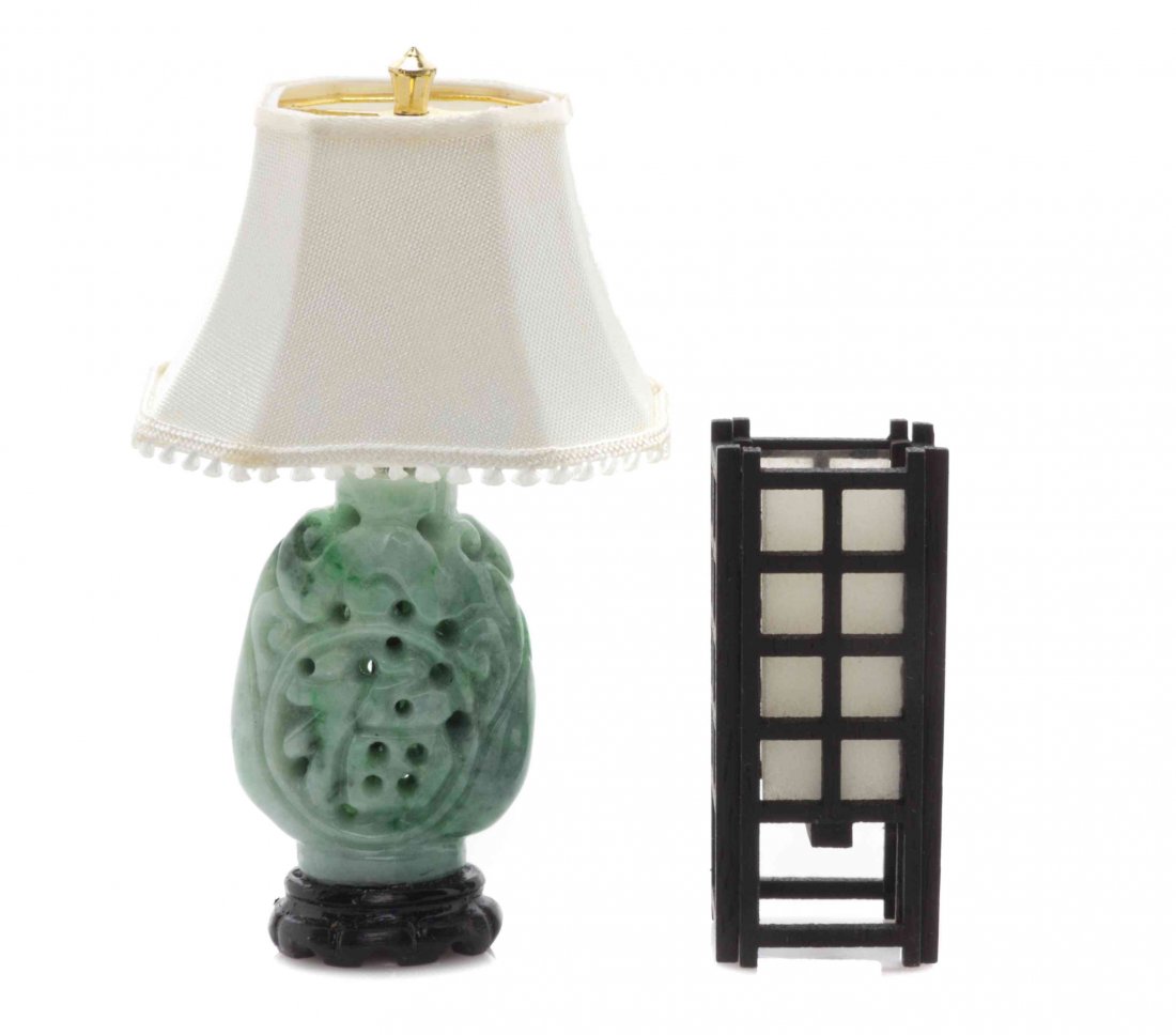 A Chinese Carved Hardstone Table Lamp, Height of taller: A Chinese Carved Hardstone Table Lamp, with a lampshade, together with a Japanese wood and paper lantern style lamp. Height of taller 2 7/8 inches. The Adell Venus Collection of Miniatures Property fr
