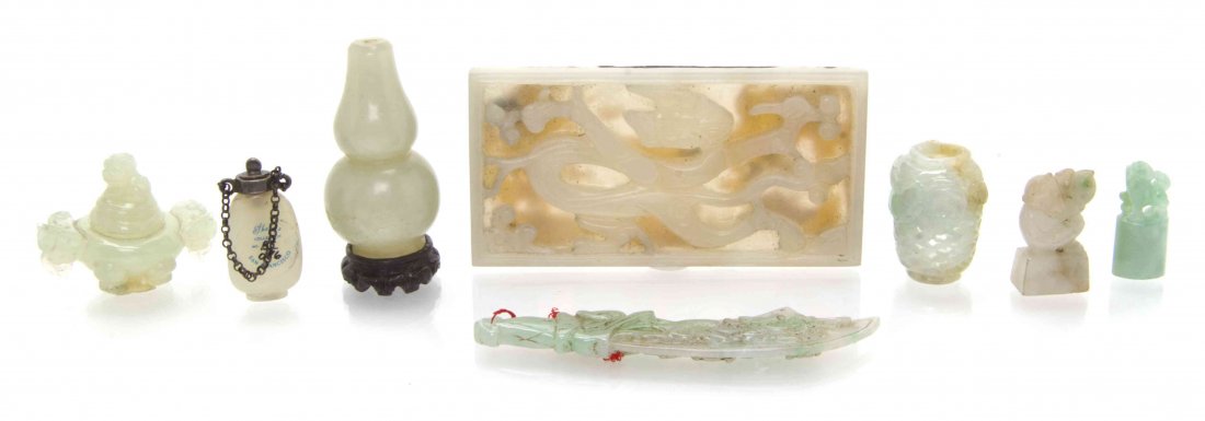 A Group of Eight Chinese Carved Jade Articles, Width of: A Group of Eight Chinese Carved Jade Articles, comprising a plaque, a lidded censer, a sword, a vase and other toggles. Width of widest 3 1/8 inches. The Adell Venus Collection of Miniatures Property 